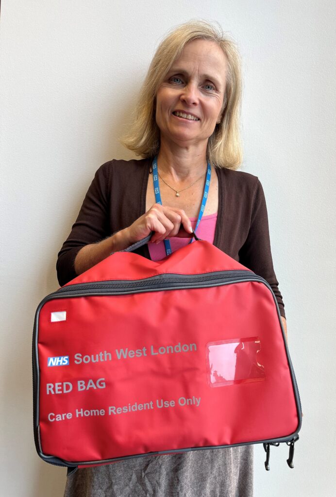Viccie Nelson with a Red Bag